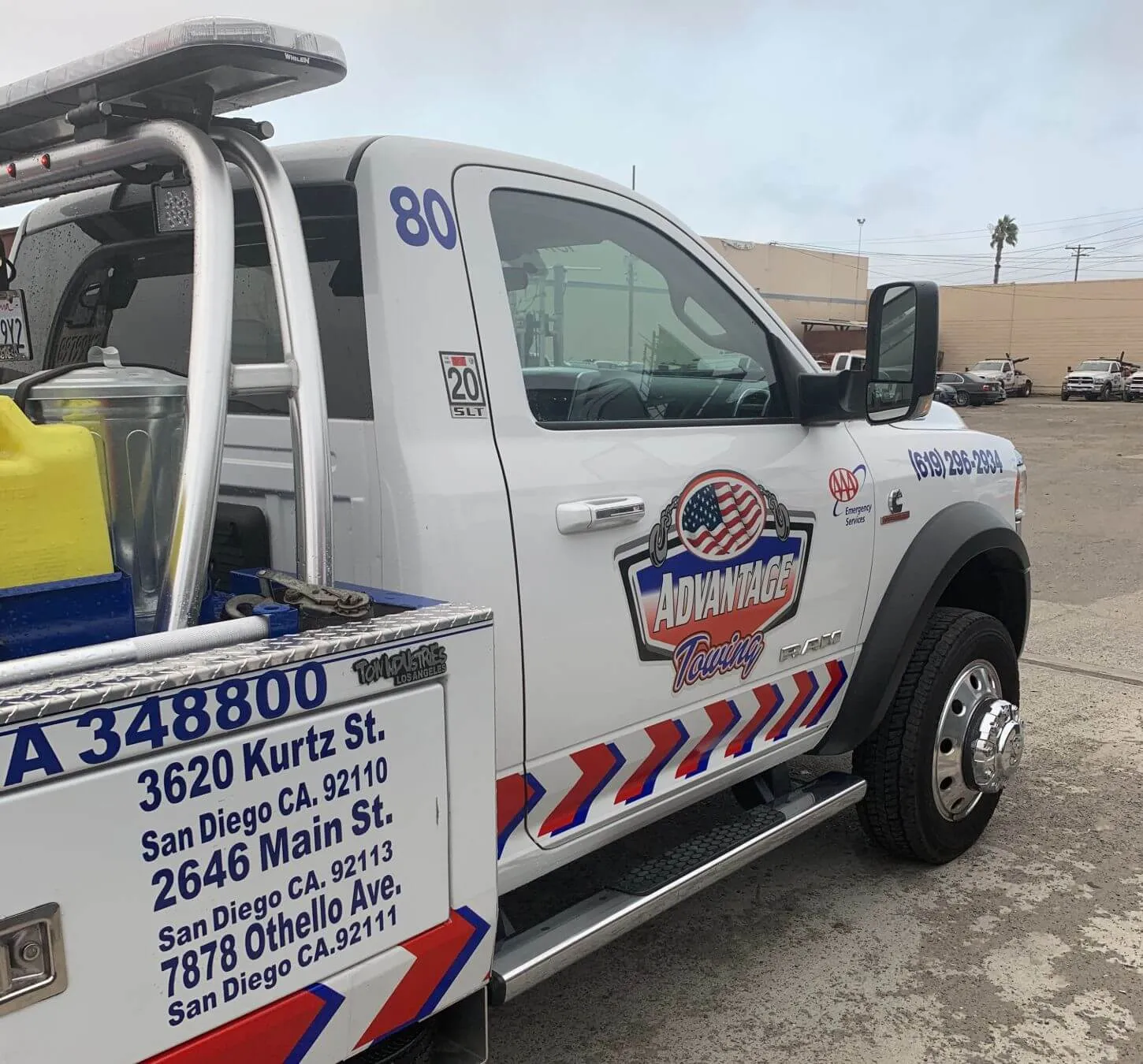 Truck door lettered with CA 348800 and the three San Diego yard addresses